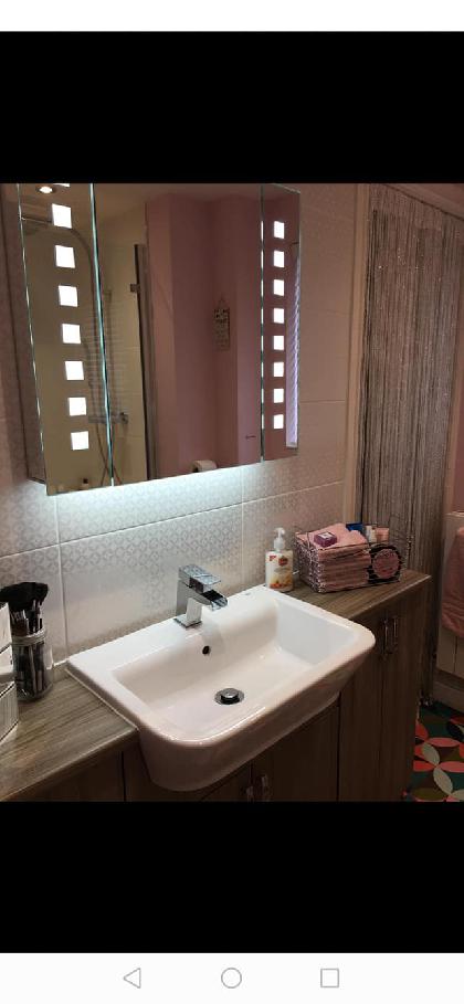 Bathroom basin with LED mirror