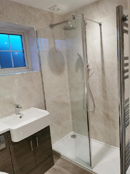 Finished shower enclosure with modern fittings